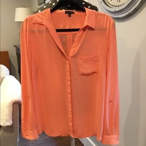 Tangerine colored blouse
